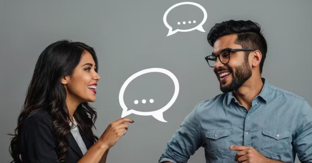 Uma mulher jovem de cabelos castanhos longos e um homem de óculos de cabelo castanho conversando.